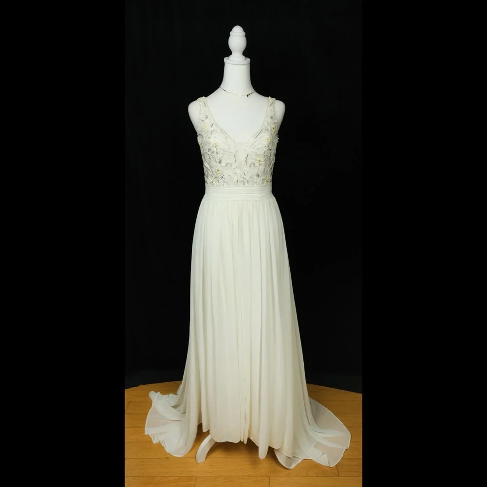 Preowned ivory and sand wedding gown dress. Size S. Very high quality. Size S - Picture 2 of 8